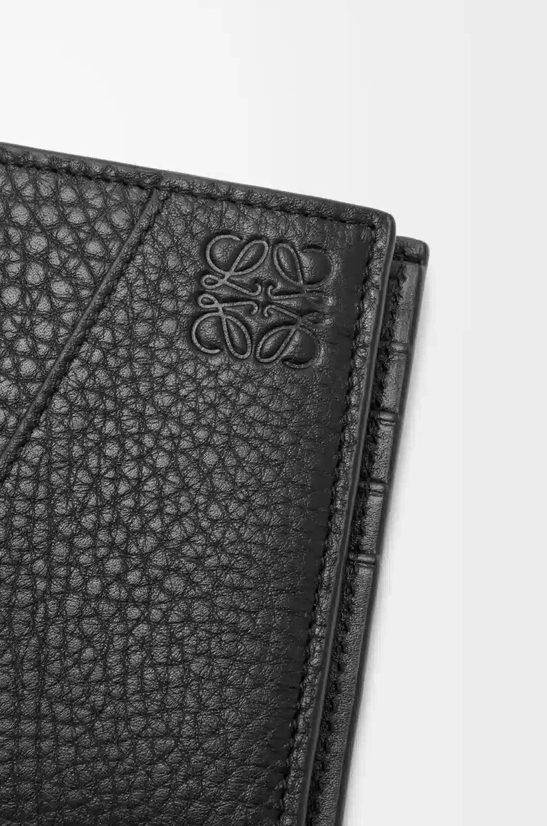 monedero plegable puzzle en piel de becerro granulada flexible color negro