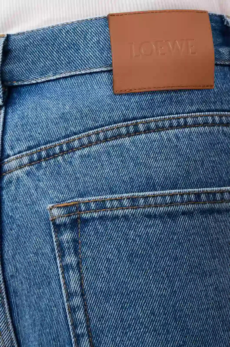 vaqueros holgados con anagrama en denim azul medio
