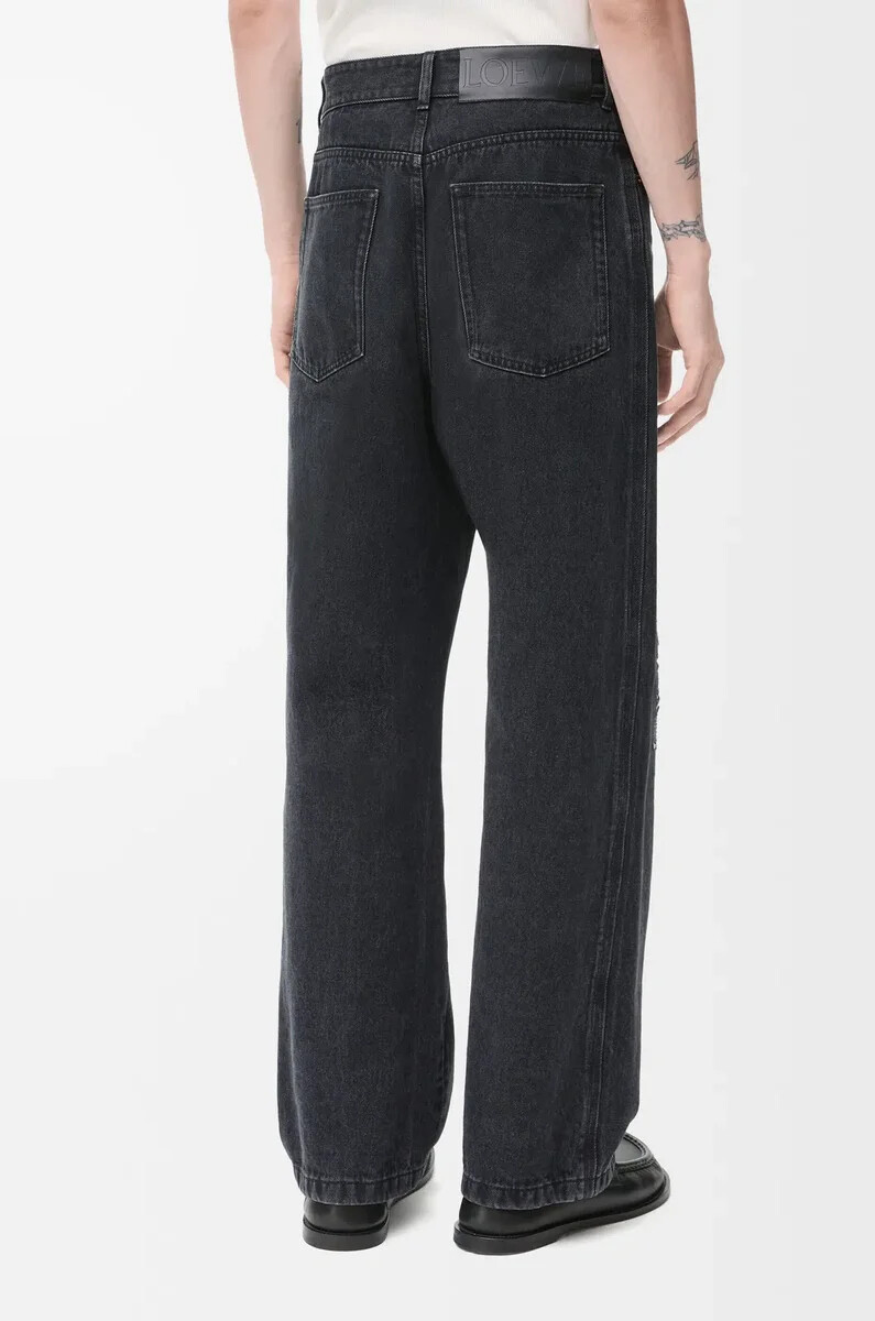vaqueros holgados con anagrama en denim negro