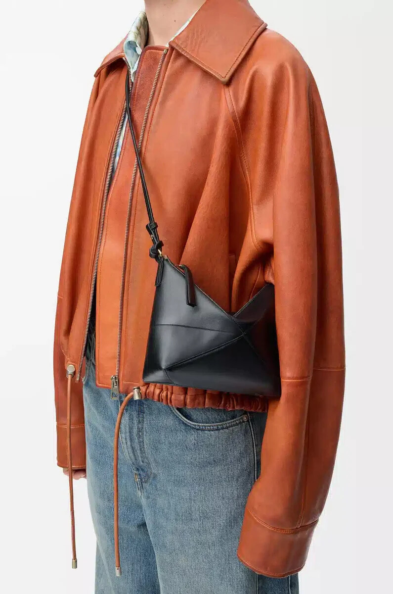 bolso puzzle fold en piel de becerro napa brillante negro