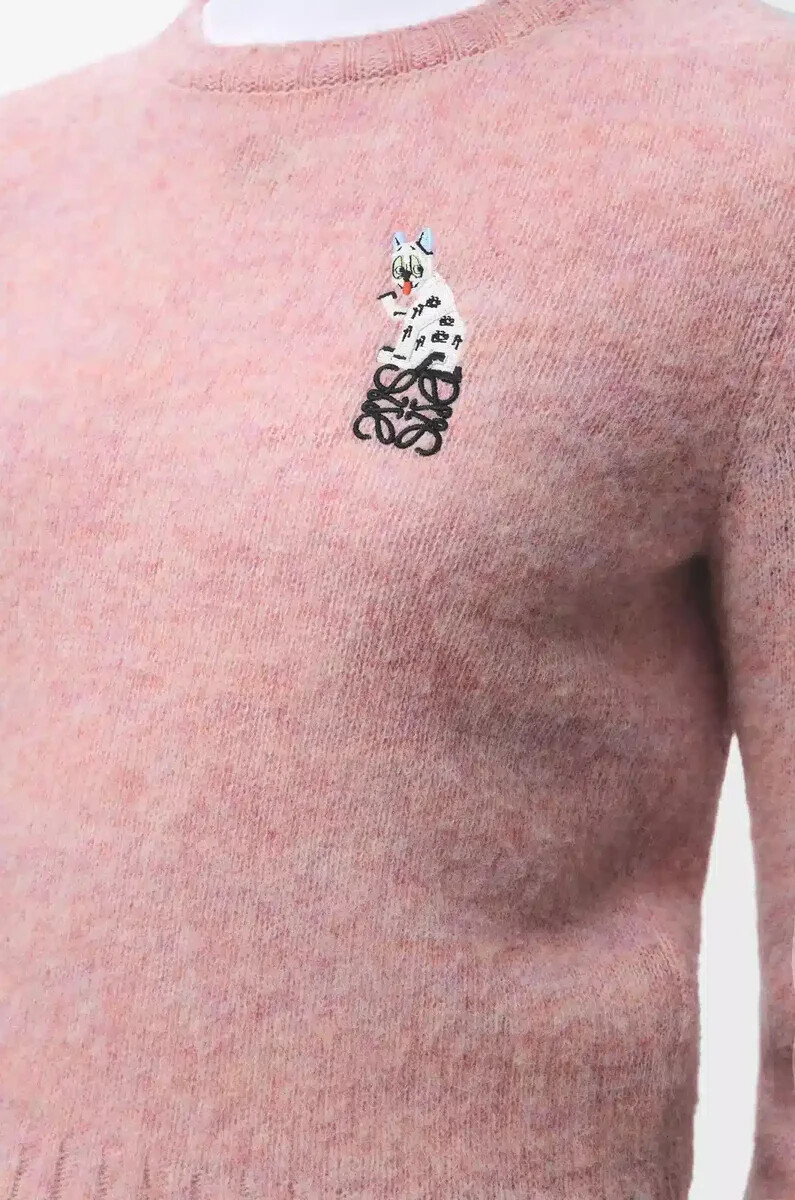 suéter de lana rosa