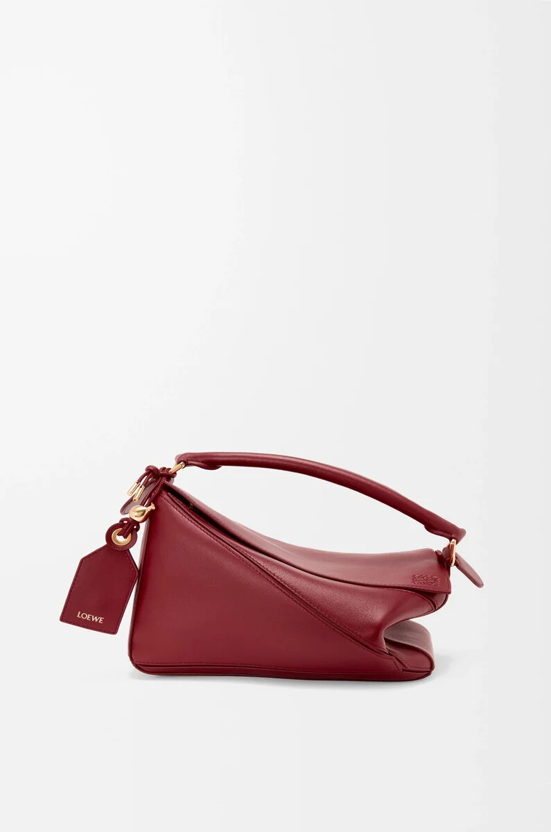 bolso puzzle pequeño featherlight en piel de cordero napa color rojo quemado